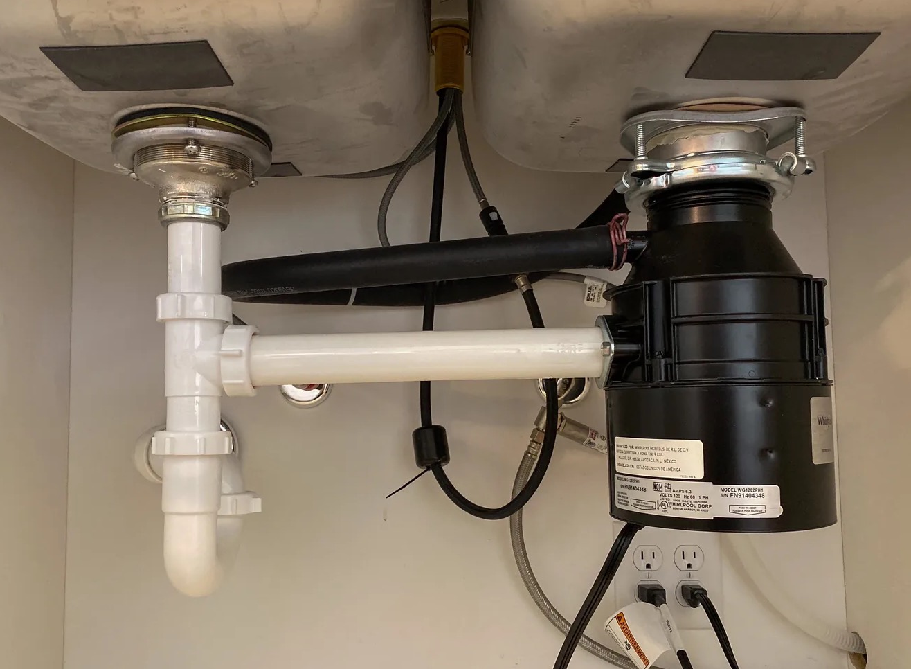 Leaky Garbage Disposal Cleanup in Surprise, AZ